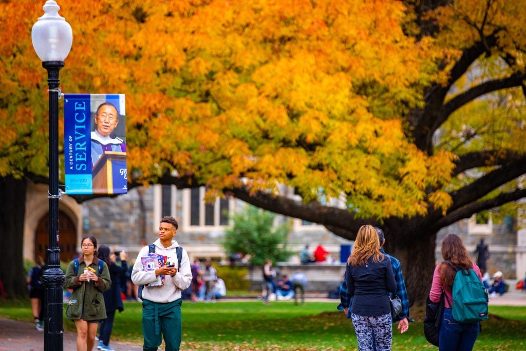 Students walking across campus